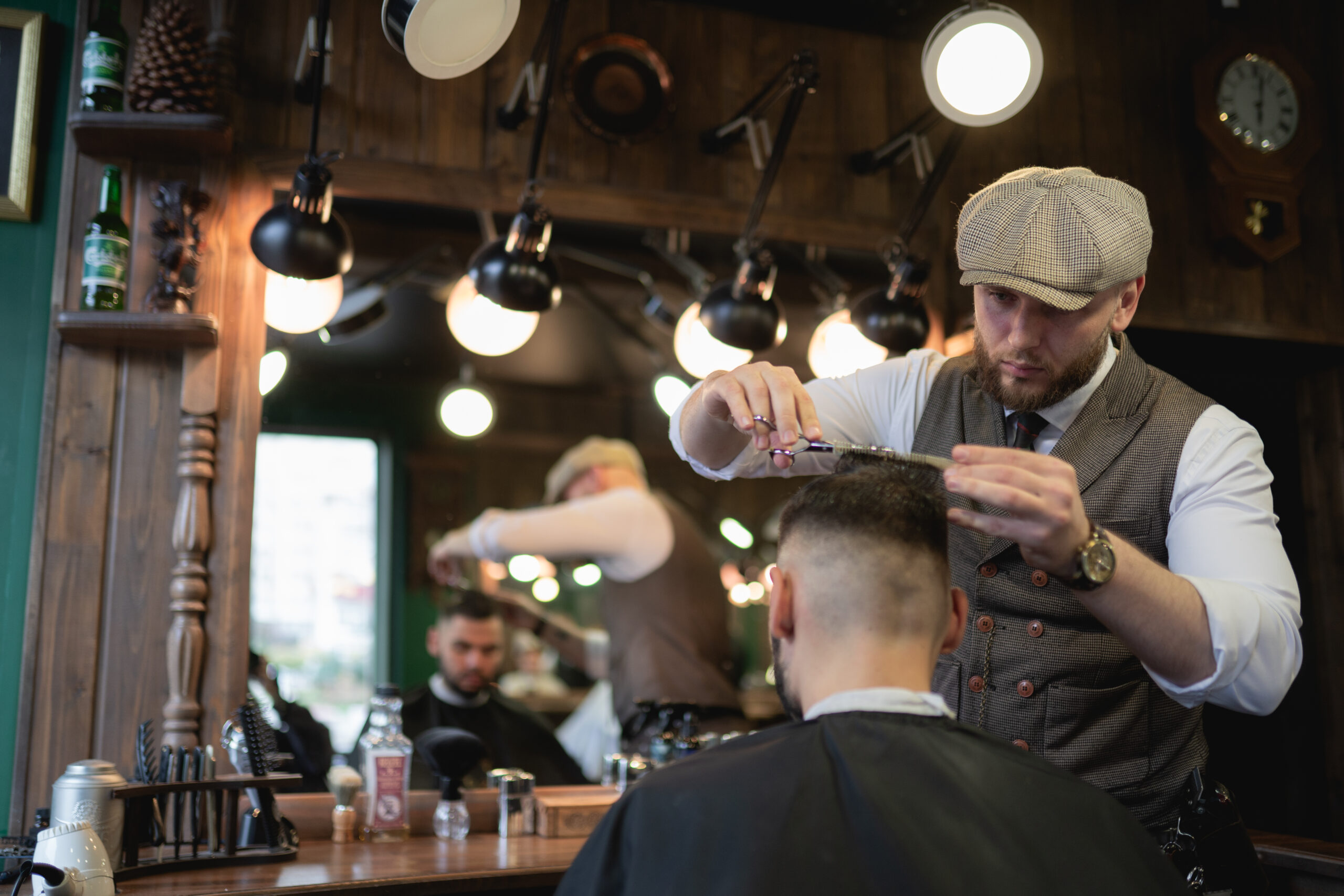 Contemporary Kult barbershop interior featuring a barber chair, large mirror, and organized grooming station