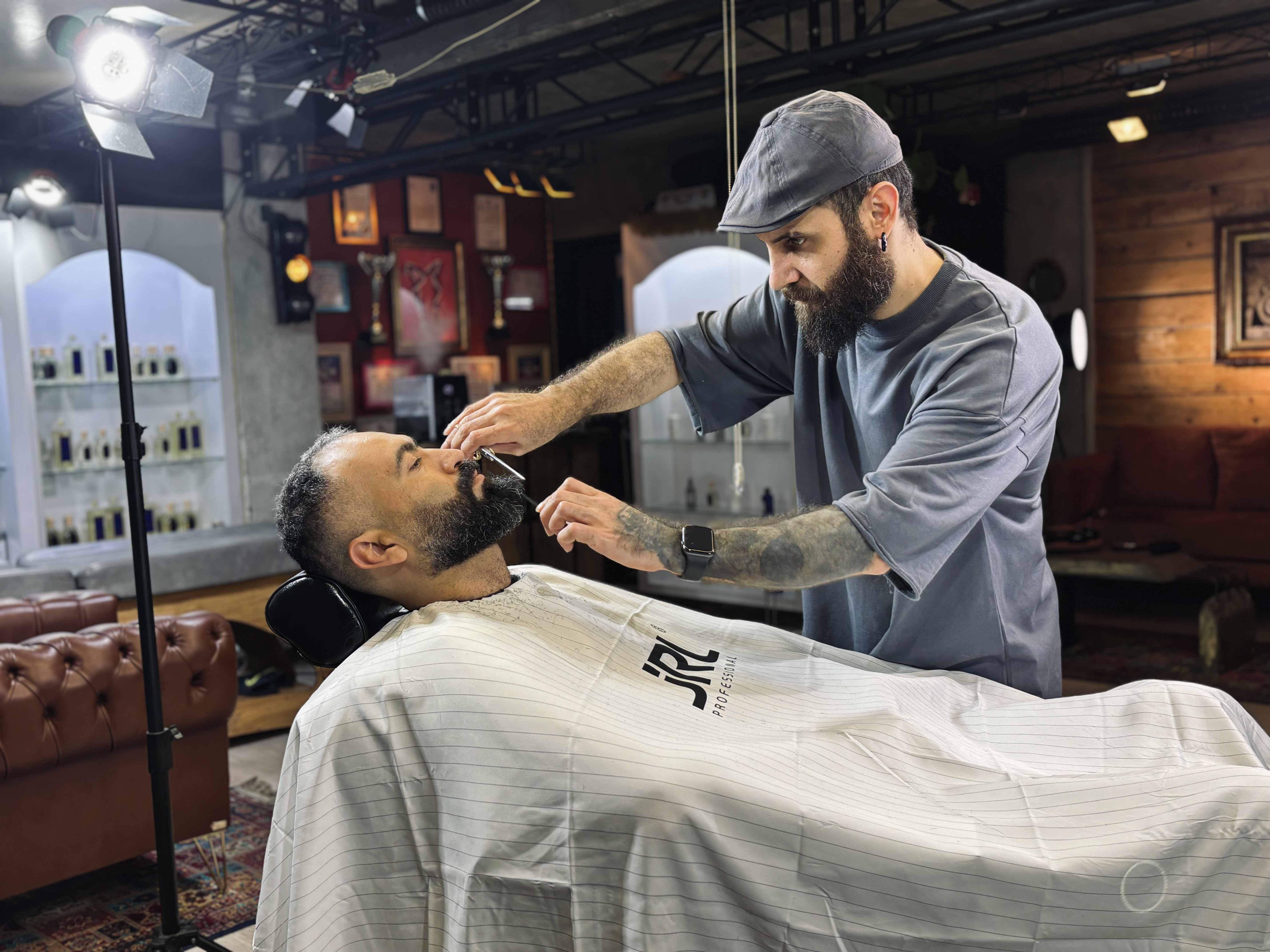 Men's grooming products and barber accessories prepared for a detailed hair and beard care routine